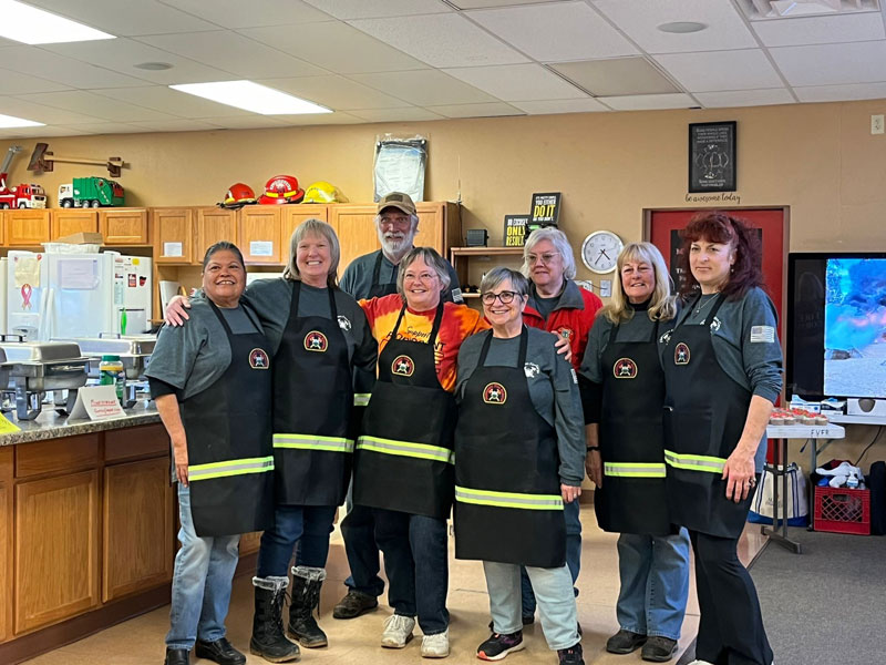 Awesome Firecorp folks taking a breaking from their food preparations to pose for a picture
